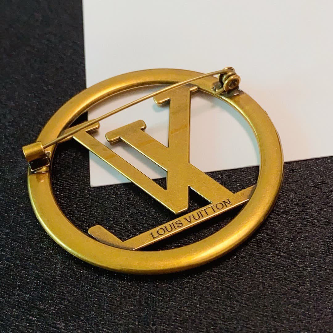 Louis Vuitton Gold Tone Logo Brooch